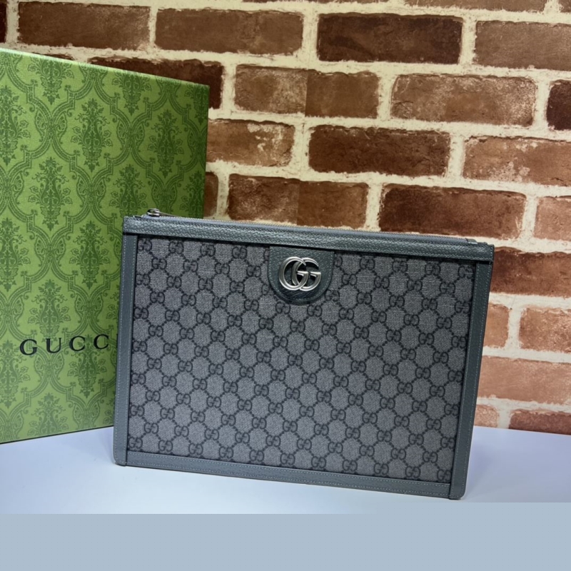 G*u*i clutch bags